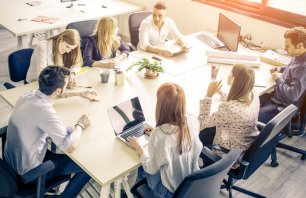 Meeting of young business people in a modern office - Start up company, workers brainstorming